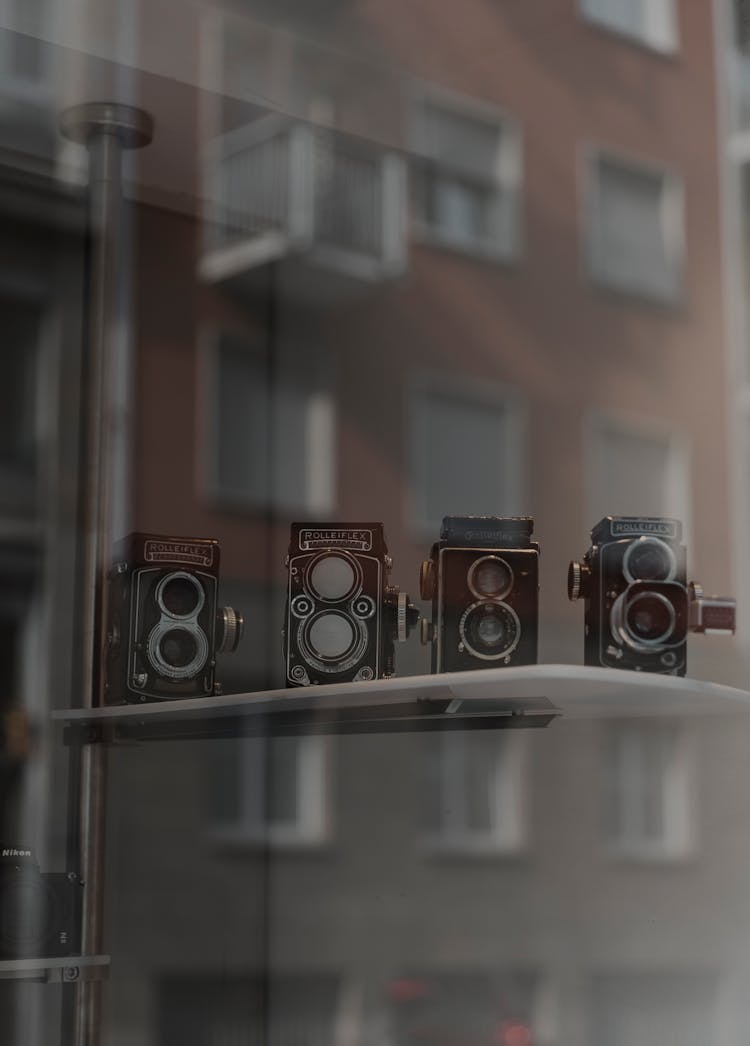 Vintage Cameras On Display In Store Window