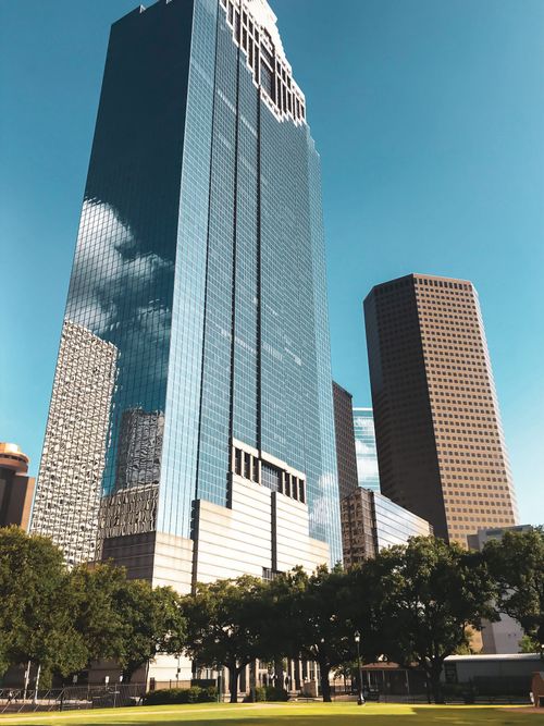 Free Tall glass skyscrapers under clear skies in downtown Houston, Texas, showcasing modern architecture. Stock Photo