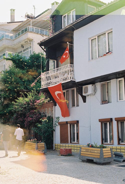 A Traditional House with Turkish Flags in City