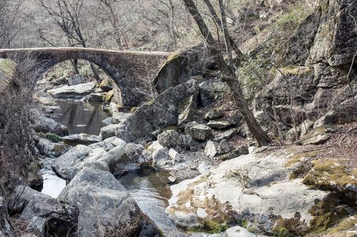 Free Explore the serene landscape of Suncheon with a historic stone bridge over a tranquil river. Stock Photo