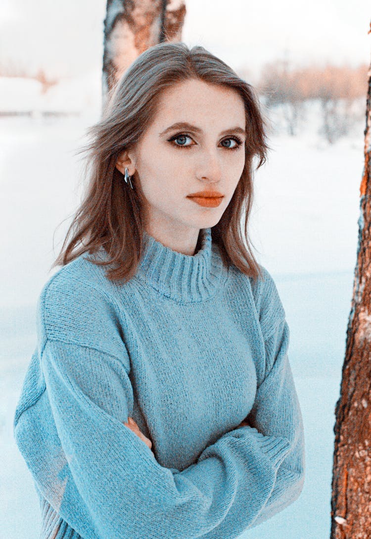 Portrait Of Woman In Sweater In Winter