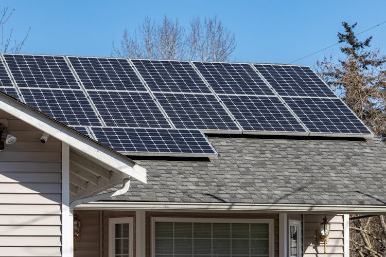 Solar Panels On House Rooftop