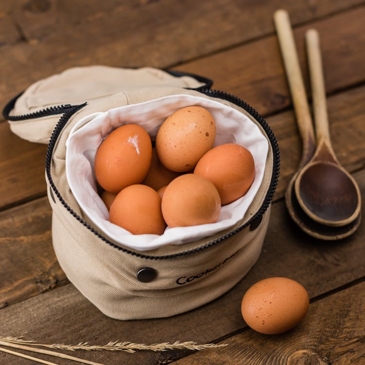 Free Beige Egg Inside a White Bag Stock Photo