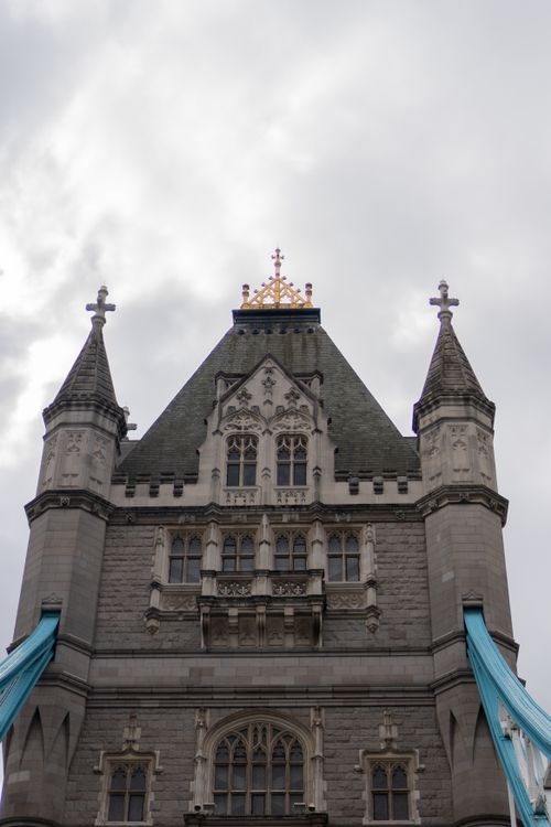 Free Close-up view of Tower Bridge architecture in London, showcasing its gothic design under a cloudy sky. Stock Photo