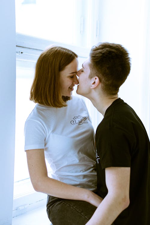 Man Kissing Womans Nose