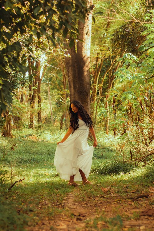 Woman in Dress in Forest