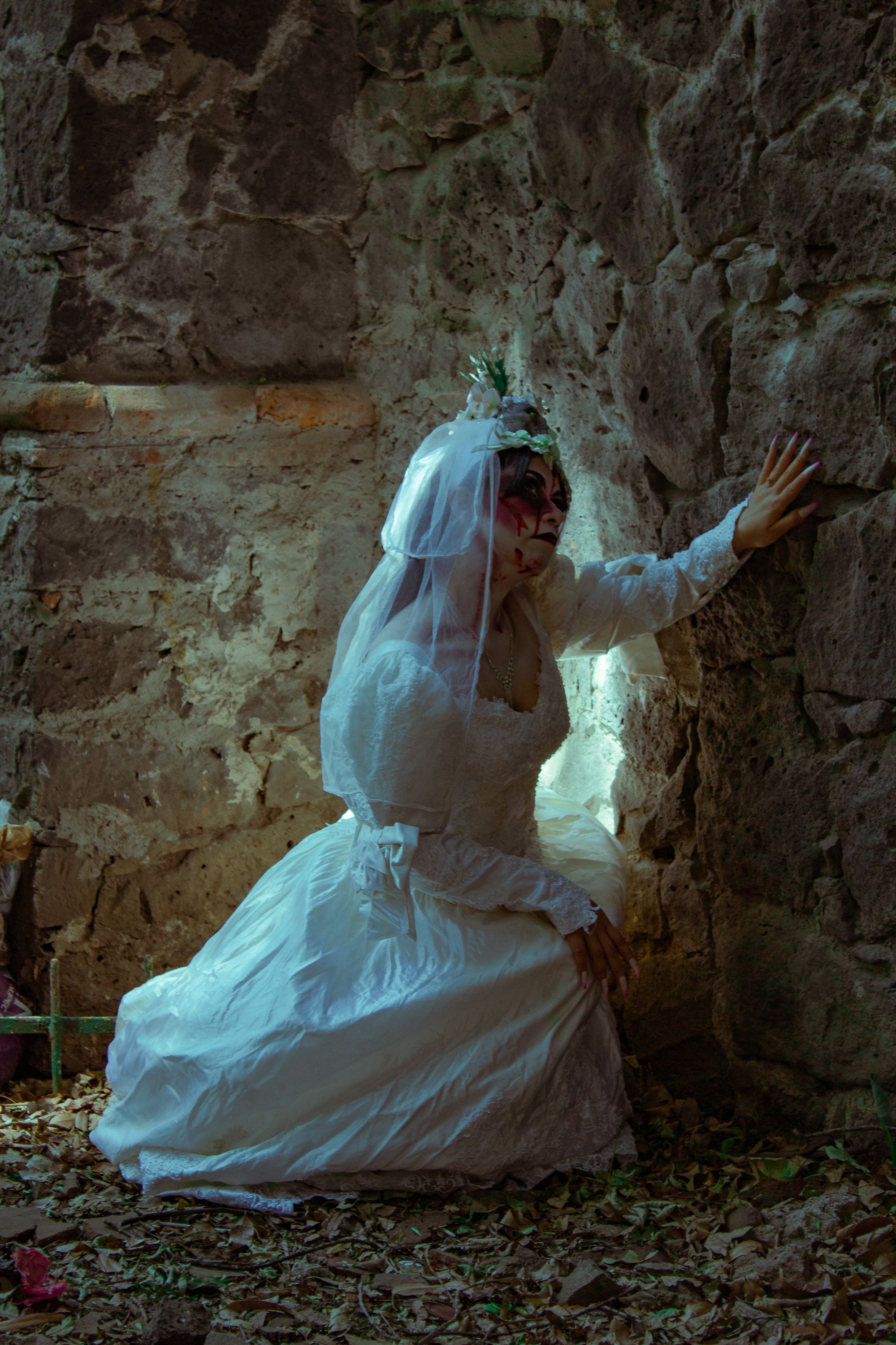 Woman in a Scary Bride Halloween Costume Leaning against a Wall · Free ...