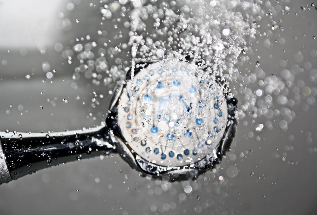 Free Black Shower Head Switched on Stock Photo