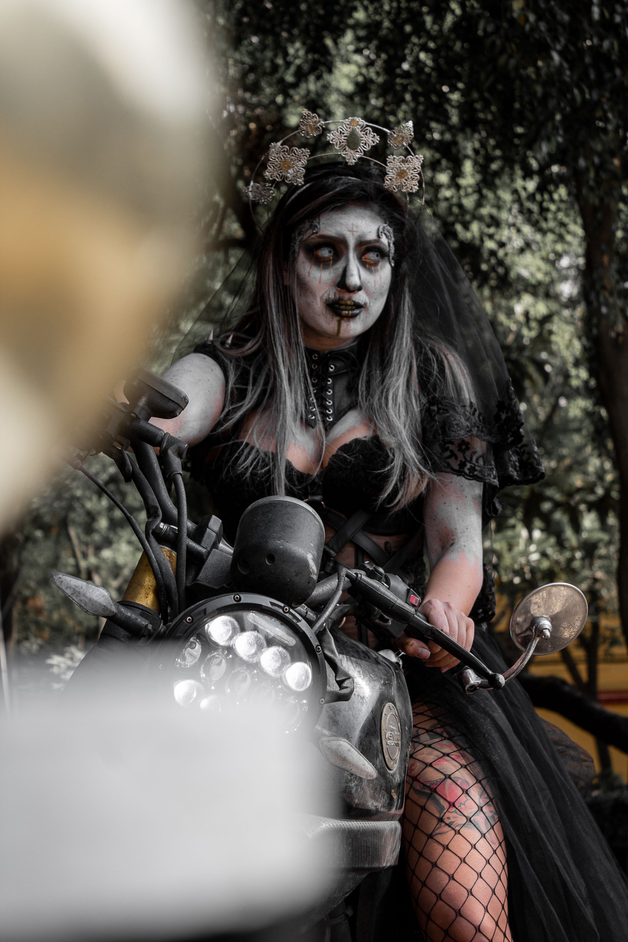 A Woman in a Goth Costume on a Motorbike · Free Stock Photo