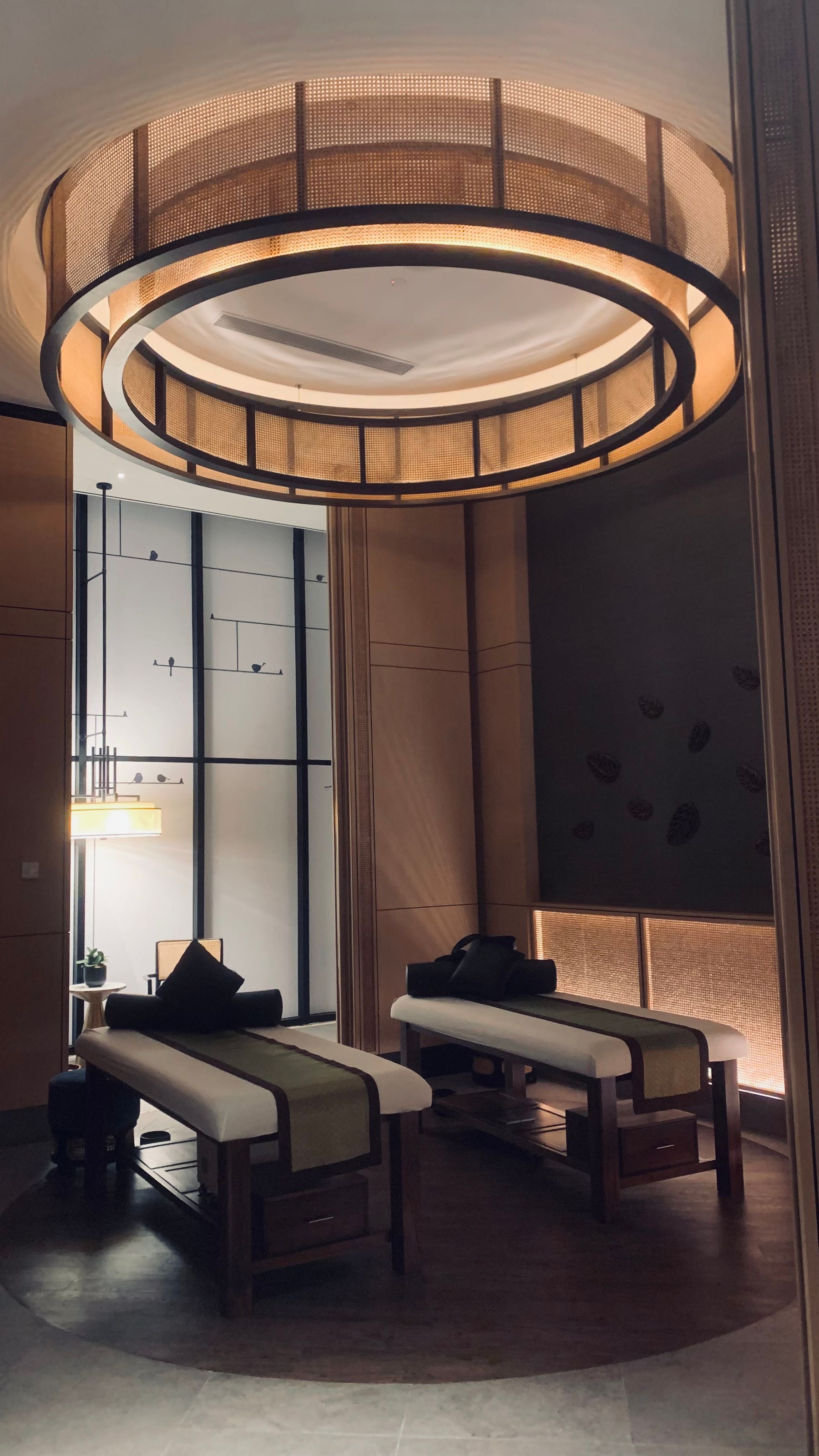 A calm spa corridor lit by warm daylight
