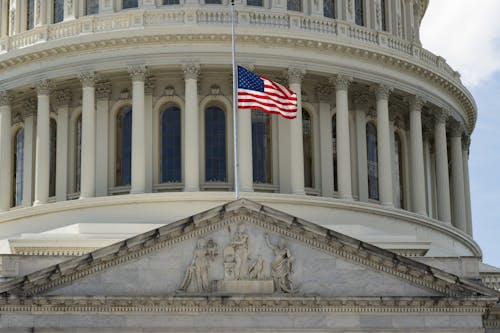 Closeup of an Administration Building with an American Flag