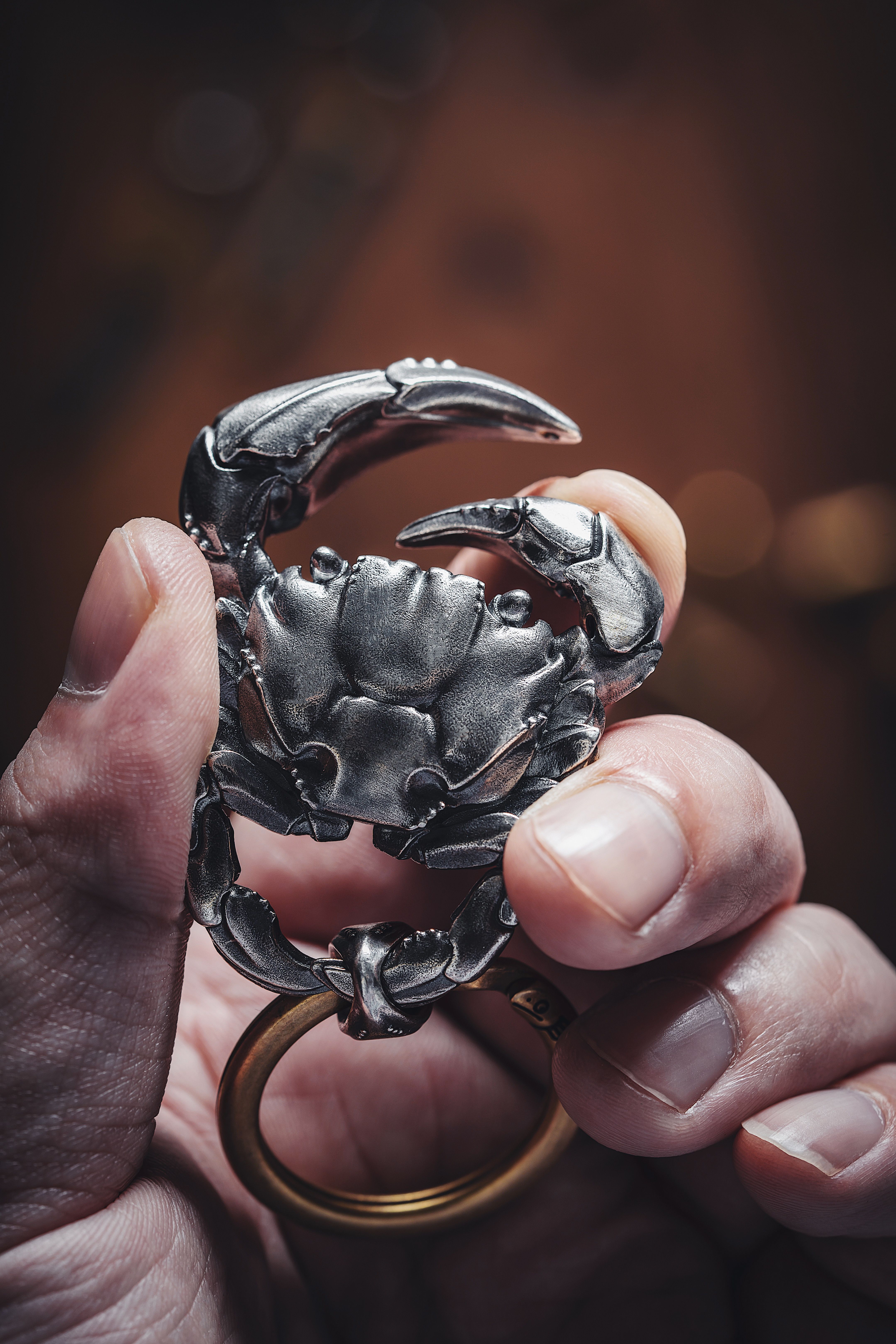 Crab Key Ring in Hand · Free Stock Photo