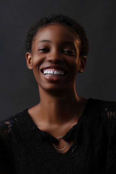 Portrait of a smiling woman — Korede Adenola on Pexels