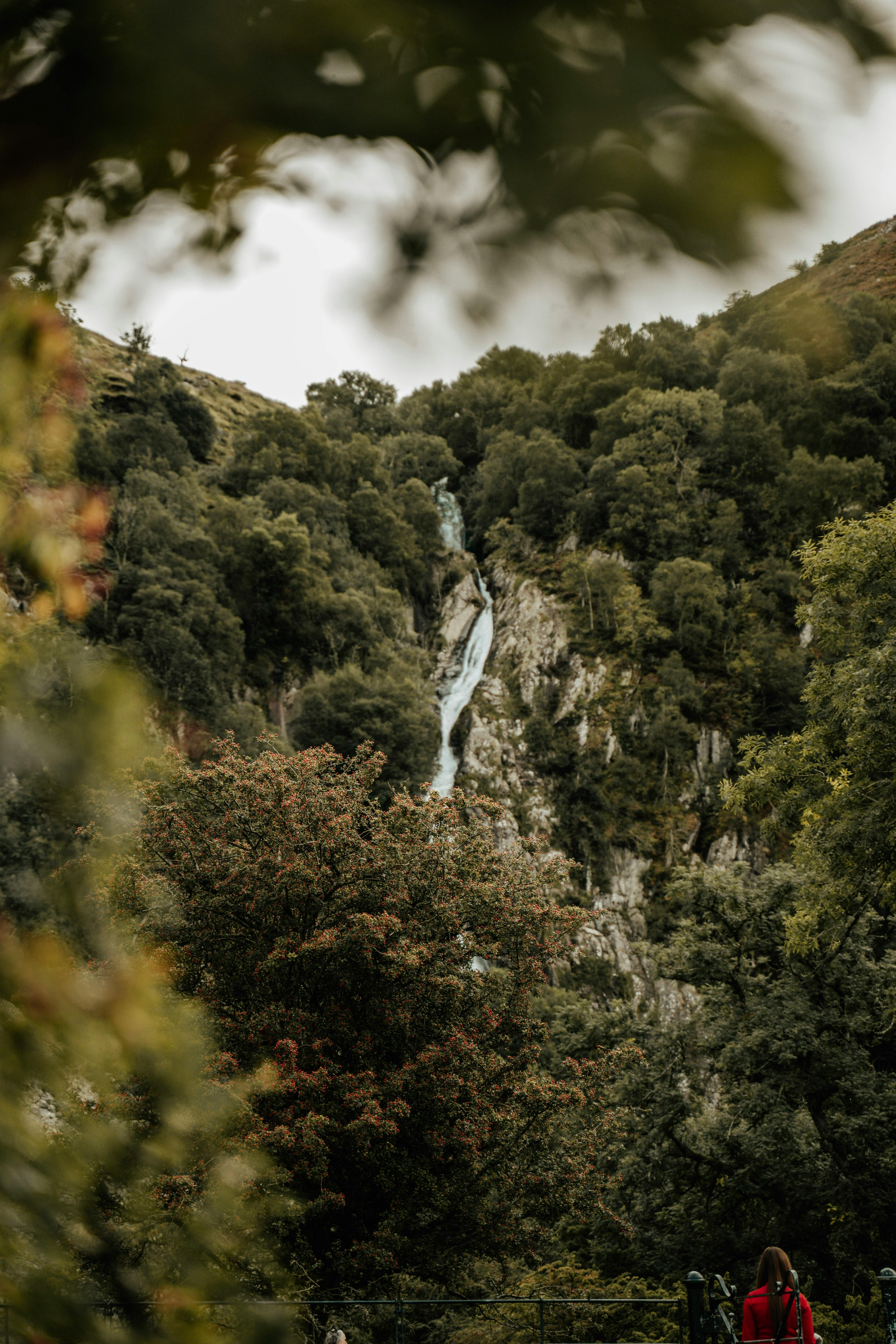 a waterfall in mountains