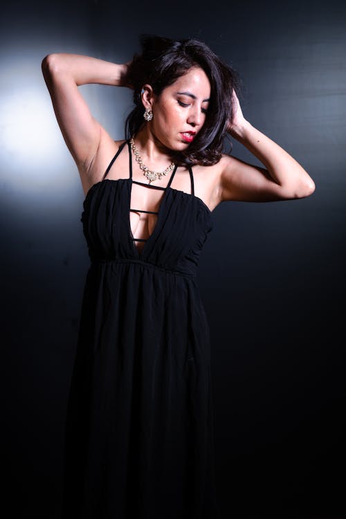 Studio Shoot of a Woman Wearing a Black Dress