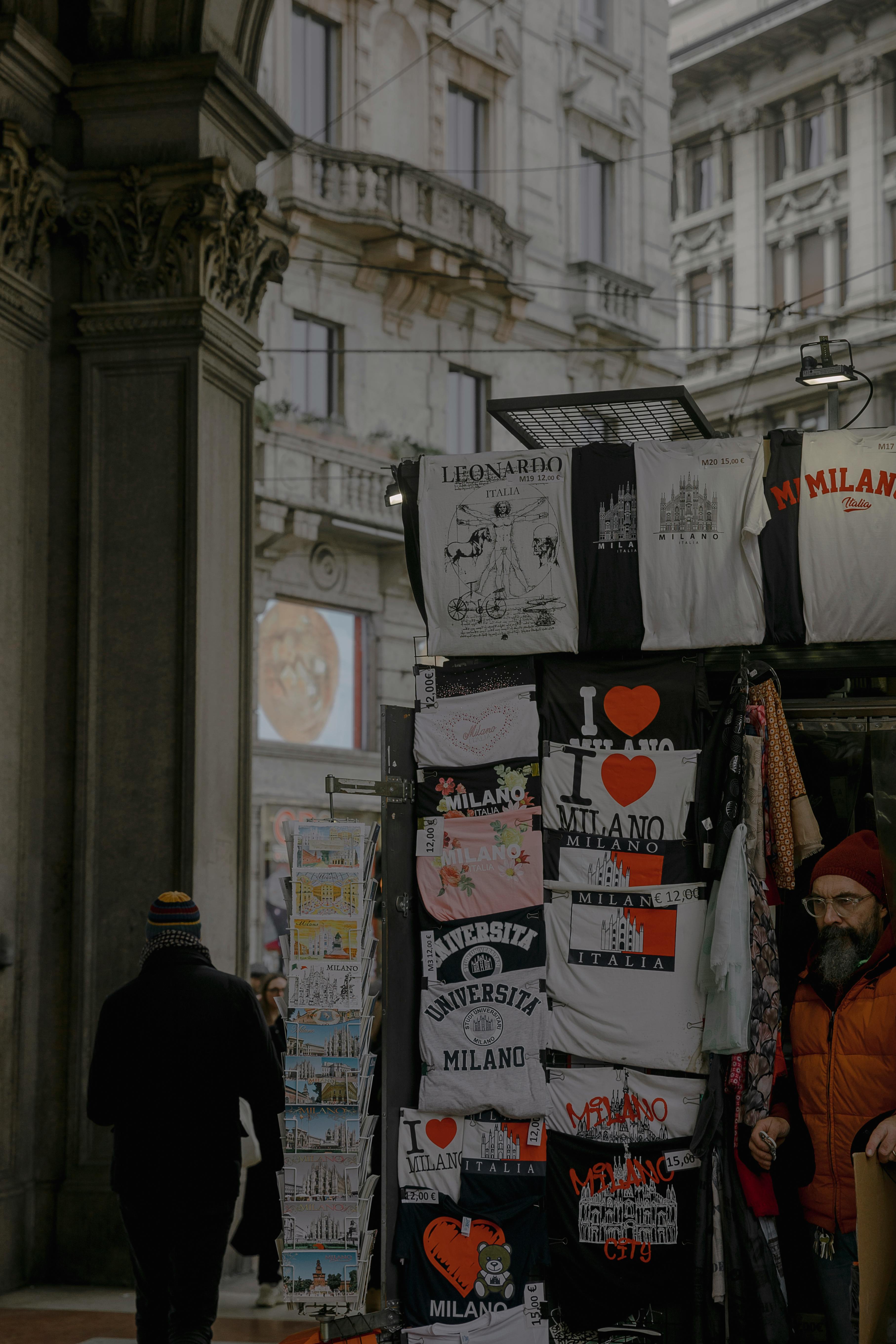 A Souvenir Shop with Tshirts and Postcards in Milan, Italy · Free Stock Photo
