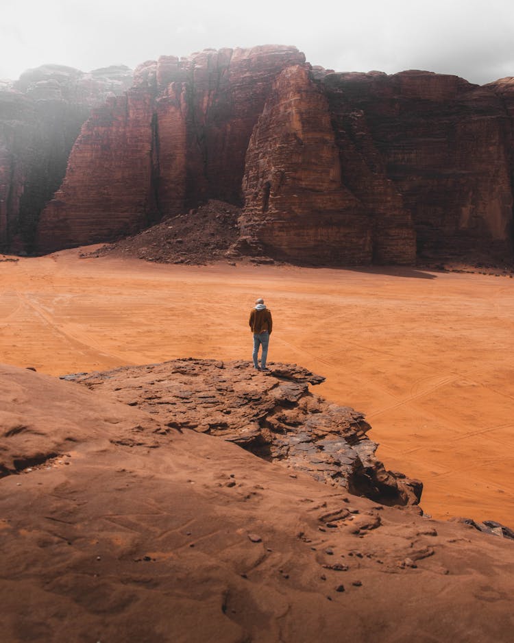 Person Looking At Rocky Landscape