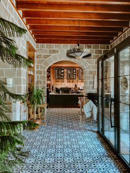 A cozy cafe entrance featuring rustic design elements and inviting decor.