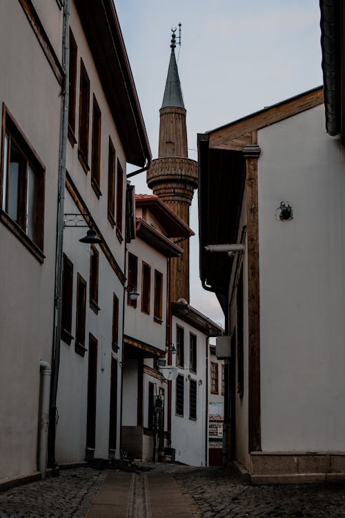 Buildings and Tower in Narrow Alley