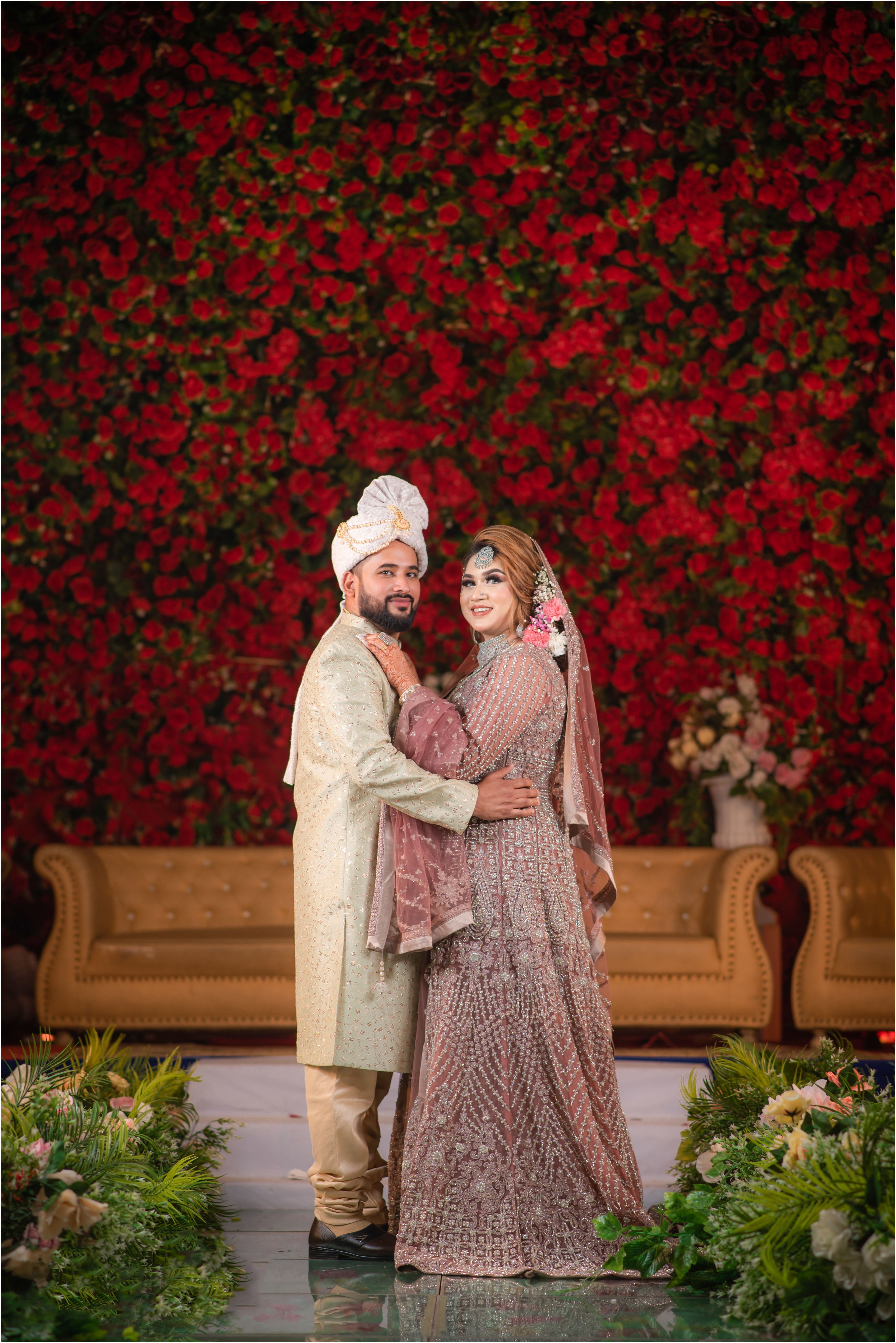 Photo of a Standing Wedding Couple Wearing Traditional Wedding Dress ...