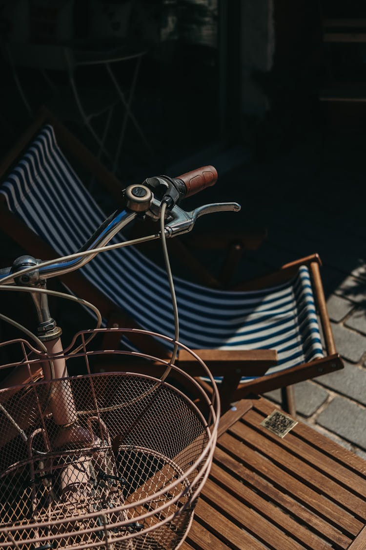 Bicycle With Basket Near Chair