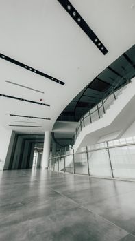 Spacious, modern interior of a building in Istanbul with a sleek staircase.