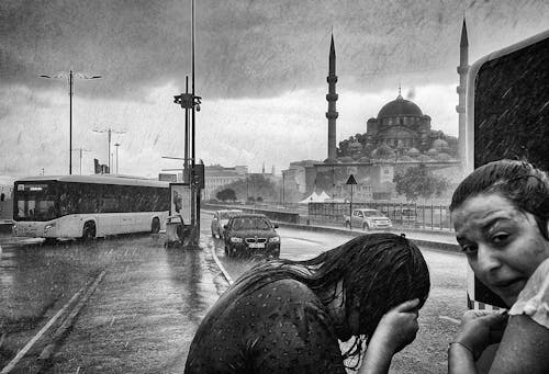 Women Surprised by Heavy Rain in Istanbul, Turkey