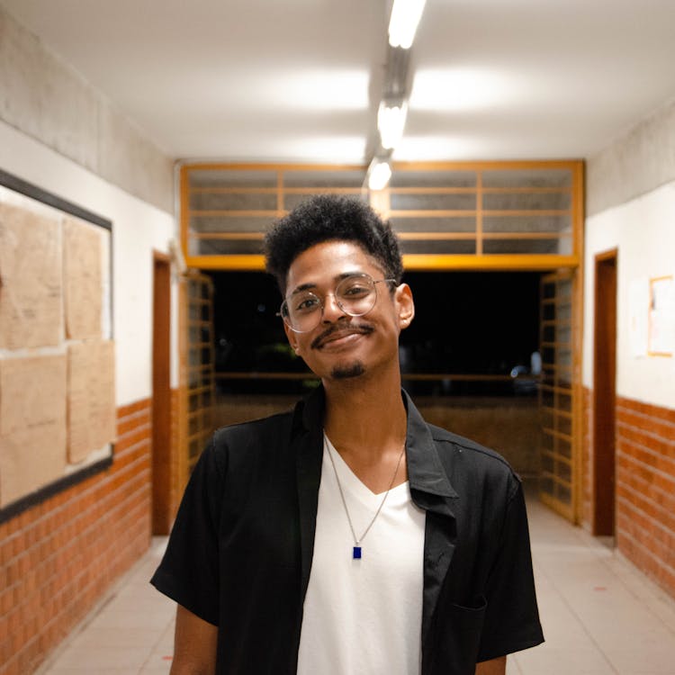 An Adult Man In Eyeglasses Smiling