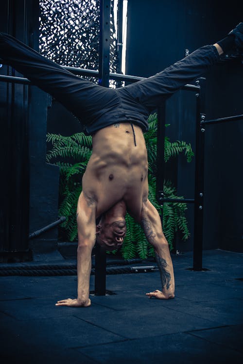 A Man Doing a Handstand