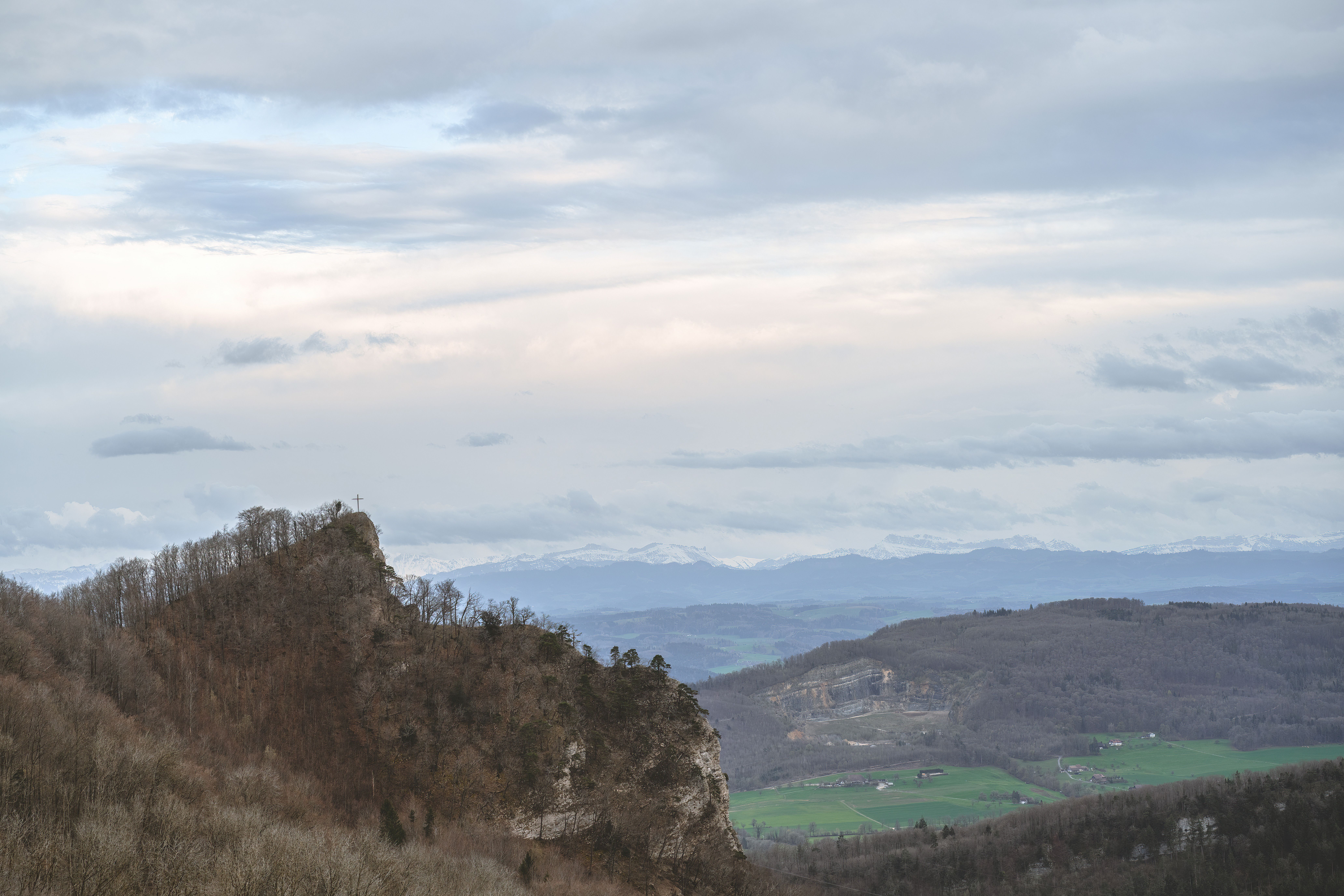 Landscape of a Valley and Mountains in Distance · Free Stock Photo