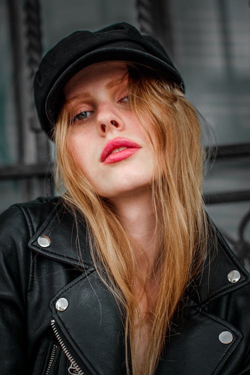 A Portrait of a Blonde Woman in a Hat