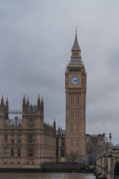 Free Majestic view of Big Ben in Westminster, London, with a cloudy sky backdrop. Stock Photo