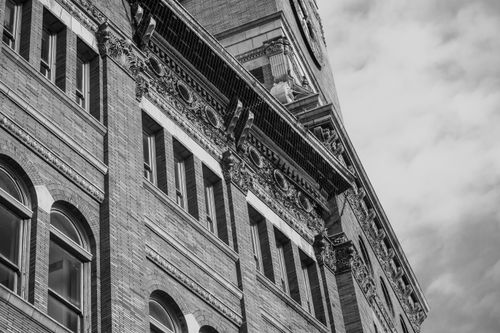 Free Detailed architectural facade in black and white, capturing classic design elements and intricate details. Stock Photo