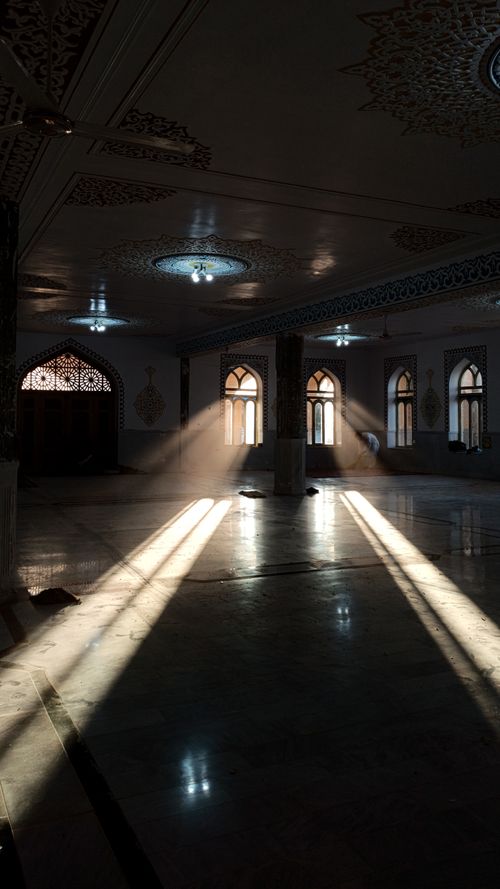 Free Sunlight streaming through windows in an ornate mosque in Khaf, Iran. Stock Photo