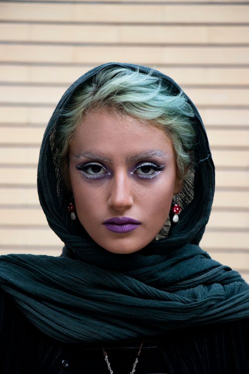 Free Close-up portrait of a woman wearing artistic makeup and a headscarf in Tabriz, Iran. Stock Photo