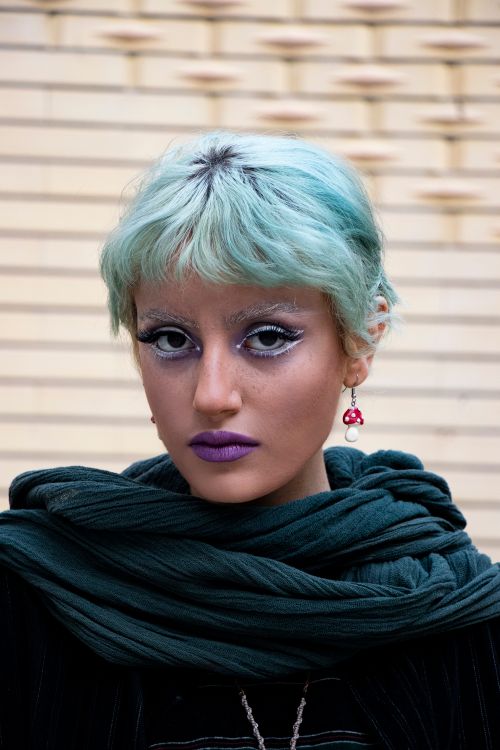 Free A striking portrait of a woman with unique makeup and fashion in Tabriz, Iran. Stock Photo