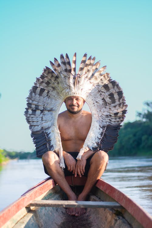 A Man Sitting in a Boat