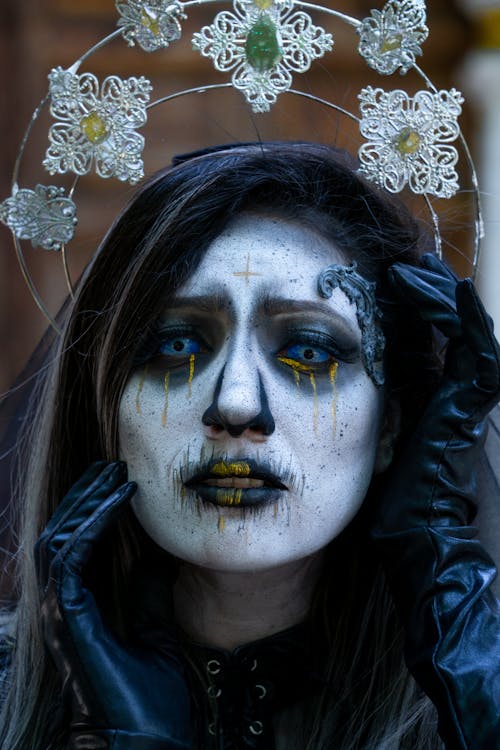 Woman in a Halloween Costume and Makeup 