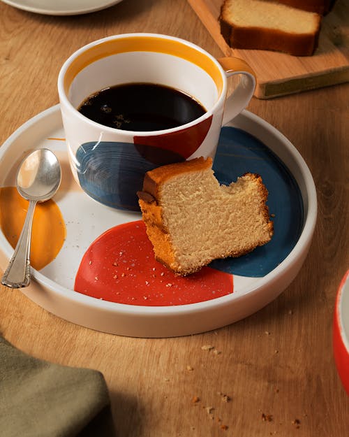 Coffee Cup and Bread on Plate