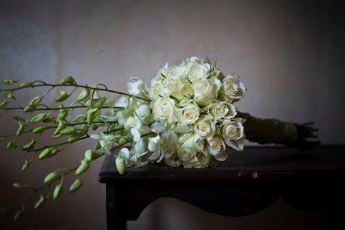 Bouquet of White Roses on Table