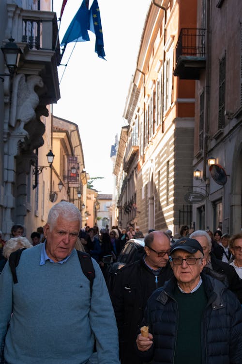 Tourists Walk in Italian Street