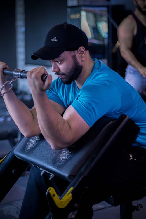 Bearded Man Exercising at Gym