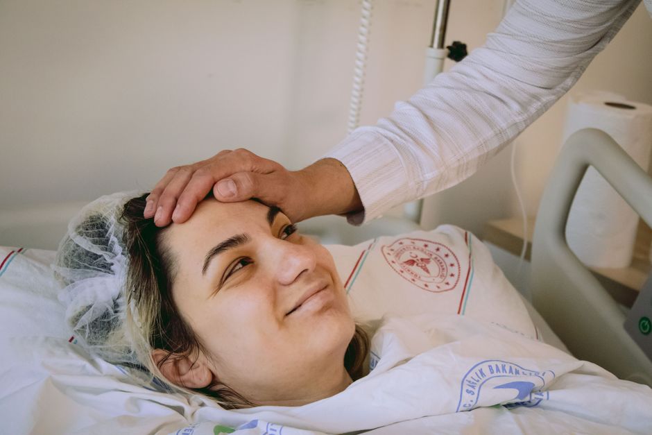 woman resting comfortably post surgery - Breast augmentation procedure woman resting comfortably post surgery - Breast augmentation procedure
