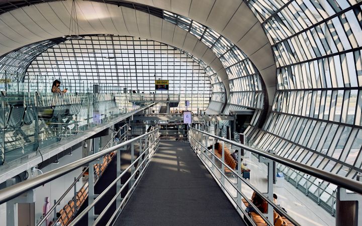 Interior view of the Suvarnabhumi Airport showcasing modern architecture and glass design.