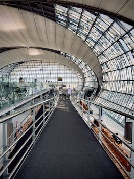Interior view of the Suvarnabhumi Airport showcasing modern architecture and glass design.