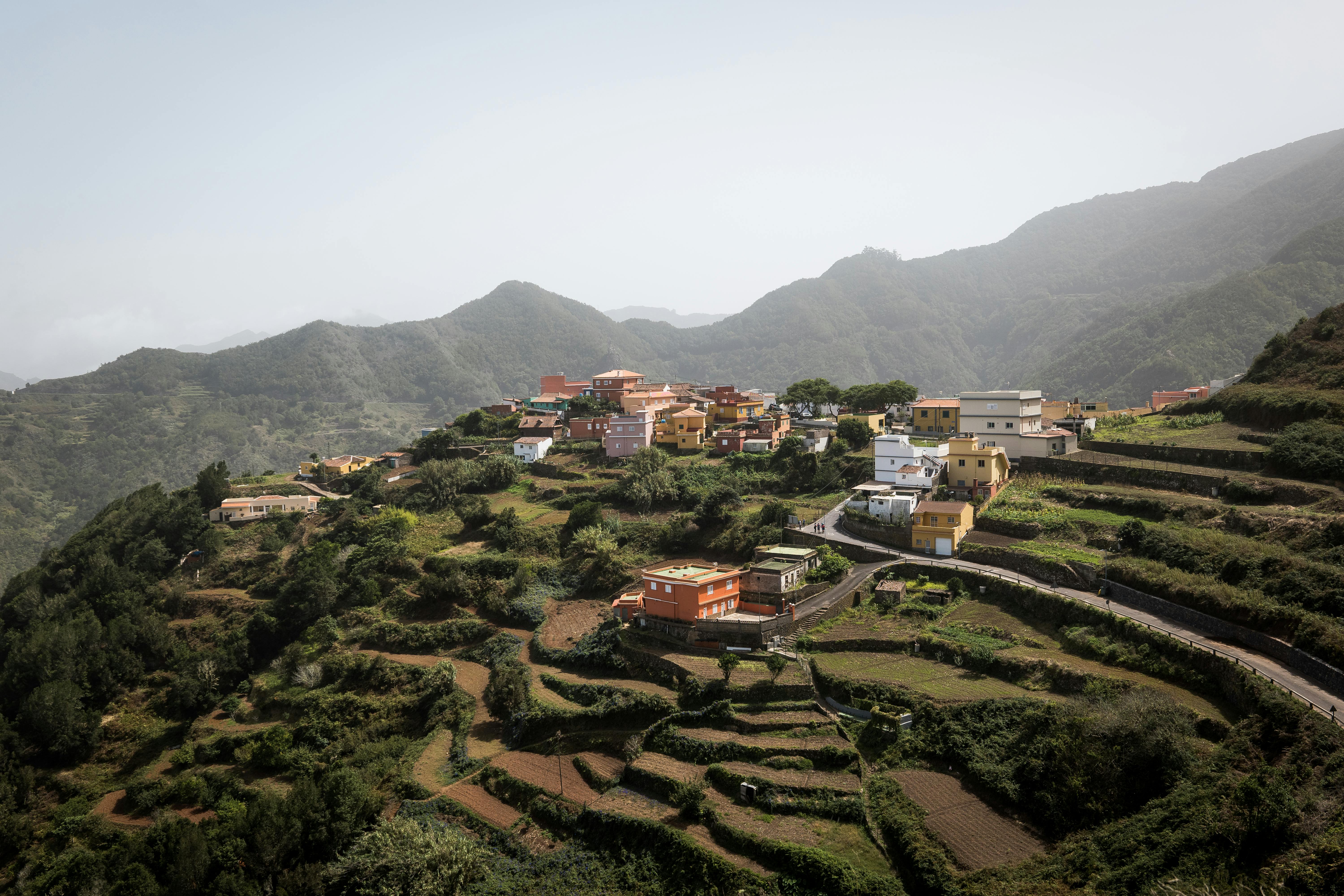 Picturesque terraced fields surrounding a village in the hills of Tenerife, Spain.