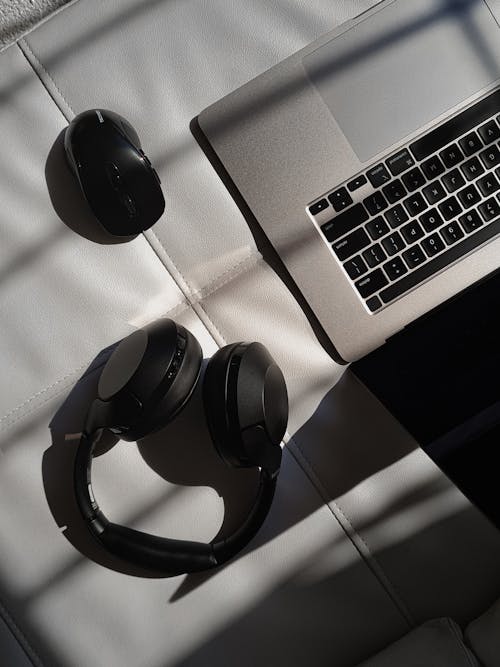 Top View of a Laptop and Headphones 