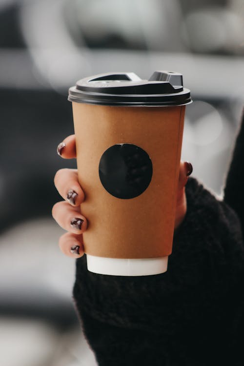 Woman Hand Holding Cup