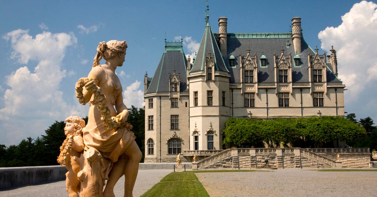 Stunning view of Biltmore Estate's chateauesque architecture and classical sculptures.