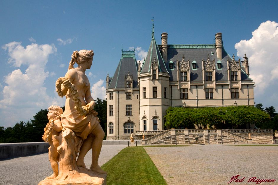 Stunning view of Biltmore Estate's chateauesque architecture and classical sculptures.